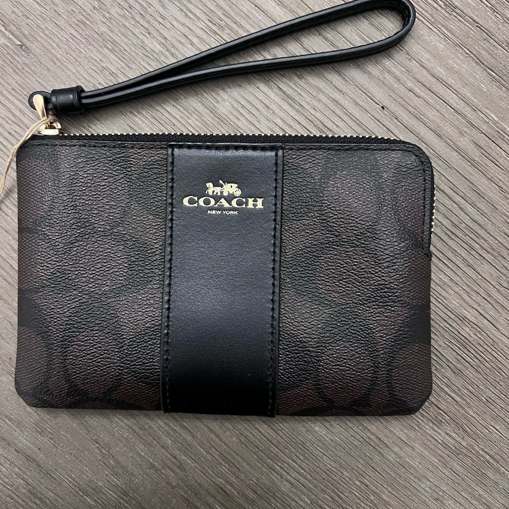 Coach corner zip wristlet in signature canvas